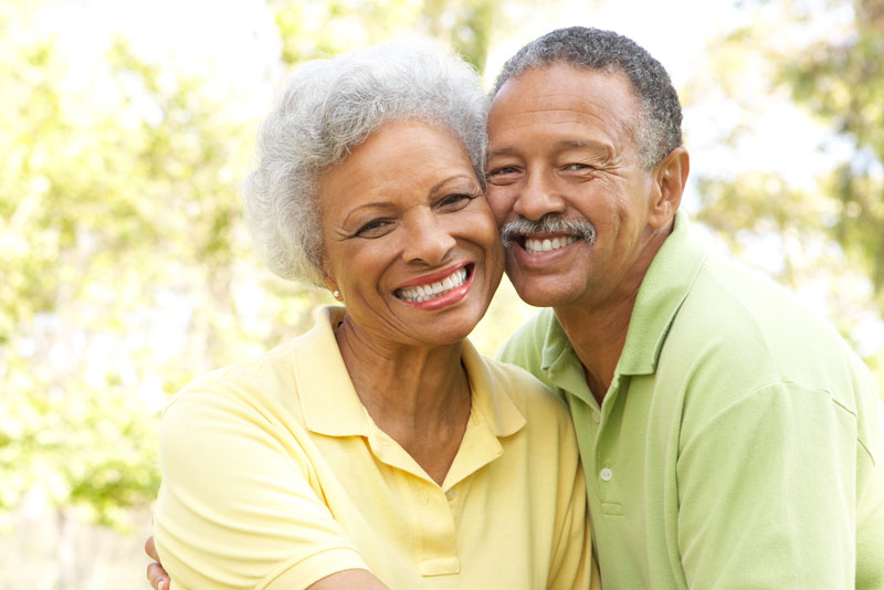 Dental Patients Smiling With Their New Dental Implants In Charlotte, NC