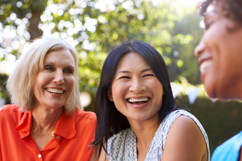 patients smiling after their cosmetic dentistry procedure