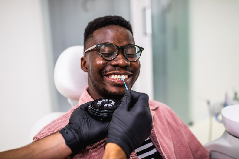 a dental patient being fitted for porcelain veneers.