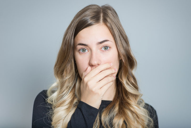 a dental implant patient with a mouth of missing teeth.