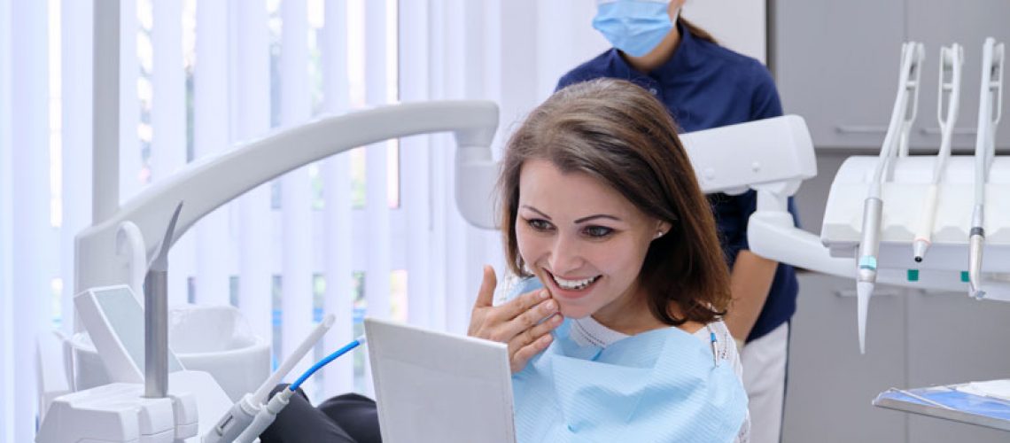 a dental veneer patient smiling after procedure.